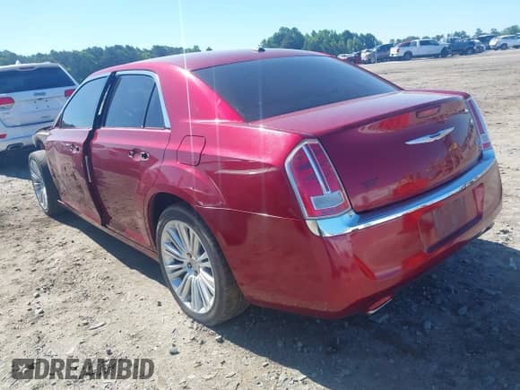 2014 Chrysler 300 C with VIN 2C3CCAEG7EH278319, listed as a IAAI auction lot 42500700 with 184,069 mi miles and . Bid and sale history available at DreamBid. Image 3.