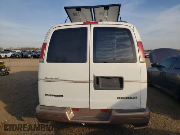 2002 Chevrolet Express z VIN 1GBFG15R721227867, wystawiony jako Copart lot #78621624 z przebiegiem 165 856 mil mil oraz Czysty tytuł • Clean title. Historia ofert i sprzedaży dostępna na DreamBid. Obrazek 6.