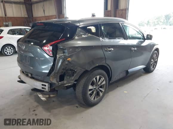 2015 Nissan Murano SL with VIN 5N1AZ2MHXFN267739, listed as a IAAI auction lot 42781220 with 86,095 mi miles and . Bid and sale history available at DreamBid. Image 4.