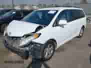 2015 Toyota Sienna LE with VIN 5TDKK3DC9FS574529, listed as a IAAI auction lot 43378279 with 169,347 mi miles and . Bid and sale history available at DreamBid. Image 18.