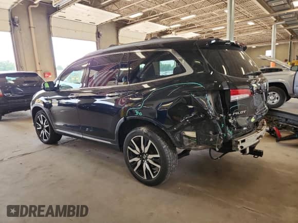 2019 Honda Pilot Touring 7-Passenger with VIN 5FNYF6H60KB008925, listed as a Copart auction lot 68154335 with 115,631 mi miles and Salvage title. Bid and sale history available at DreamBid. Image 2.