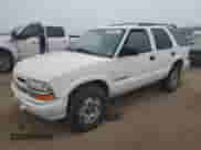 2002 Chevrolet Blazer LS z VIN 1GNDT13W02K156455, wystawiony jako Copart lot #86728515 z przebiegiem 129 995 mil mil oraz Szkoda całkowita • Salvage title. Historia ofert i sprzedaży dostępna na DreamBid. Obrazek 1.