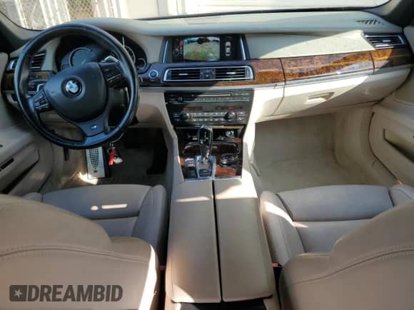 2015 BMW 7 Series 750Li with VIN WBAYE8C55FD782370, listed as a Copart auction lot 64495155 with 102,015 mi miles and Salvage title. Bid and sale history available at DreamBid. Image 8.
