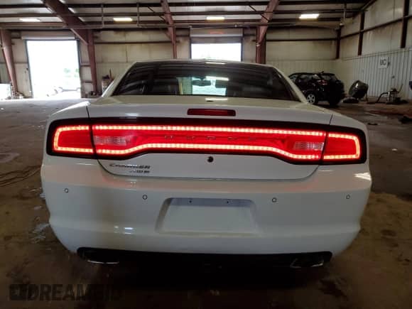2014 Dodge Charger Police с VIN 2C3CDXKT6EH280127, выставлен на аукционе Copart как лот 82289045 с пробегом 76 673 миль миль и Чистый • Clean title. История ставок и продаж доступна на DreamBid. Изображение 6.