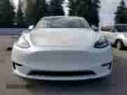 2020 Tesla Model Y Long Range с VIN 5YJYGDEE6LF023427, выставлен на аукционе Copart как лот 81877945 с пробегом 52 307 миль миль и Списание • Salvage title. История ставок и продаж доступна на DreamBid. Изображение 5.