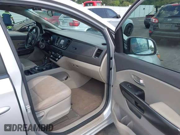 2016 Kia Sedona L with VIN KNDMA5C15G6206471, listed as a IAAI auction lot 43167369 with 143,290 mi miles and . Bid and sale history available at DreamBid. Image 5.