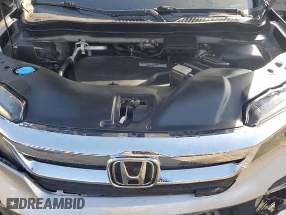 2019 Honda Pilot EX-L z VIN 5FNYF5H5XKB034952, wystawiony jako Copart lot #64754055 z przebiegiem 82 714 mil mil oraz Szkoda całkowita • Salvage title. Historia ofert i sprzedaży dostępna na DreamBid. Obrazek 12.