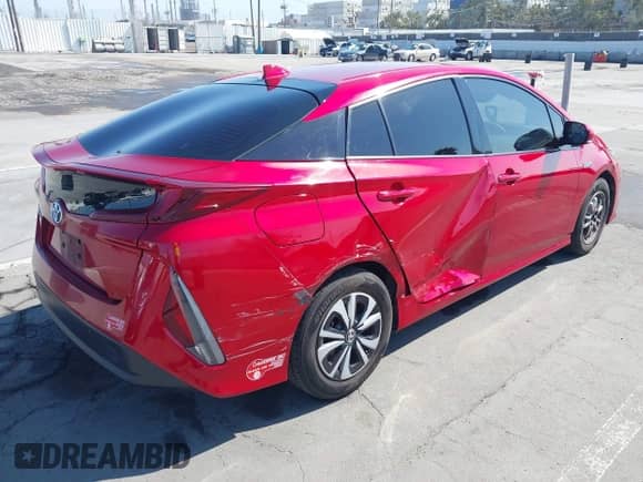 2018 Toyota Prius Plus z VIN JTDKARFP7J3075941, wystawiony jako IAAI lot #43061890 z przebiegiem 117 714 mil mil oraz . Historia ofert i sprzedaży dostępna na DreamBid. Obrazek 4.
