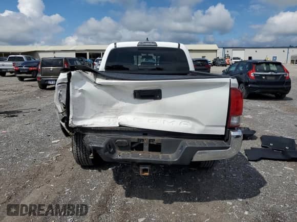 2017 Toyota Tacoma TRD Off Road with VIN 3TMDZ5BNXHM027454, listed as a Copart auction lot 84053695 with 131,703 mi miles and Salvage title. Bid and sale history available at DreamBid. Image 6.