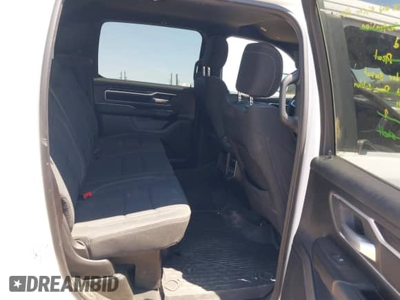 2023 Ram 1500 Big Horn with VIN 1C6SRFMTXPN670827, listed as a IAAI auction lot 42626215 with 22,172 mi miles and . Bid and sale history available at DreamBid. Image 8.