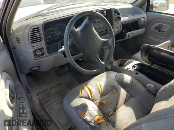 1996 Chevrolet Tahoe с VIN 1GNEC13R8TJ421533, выставлен на аукционе Copart как лот 76129824 с пробегом 190 015 миль миль и На запчасти • Non repairable. История ставок и продаж доступна на DreamBid. Изображение 8.
