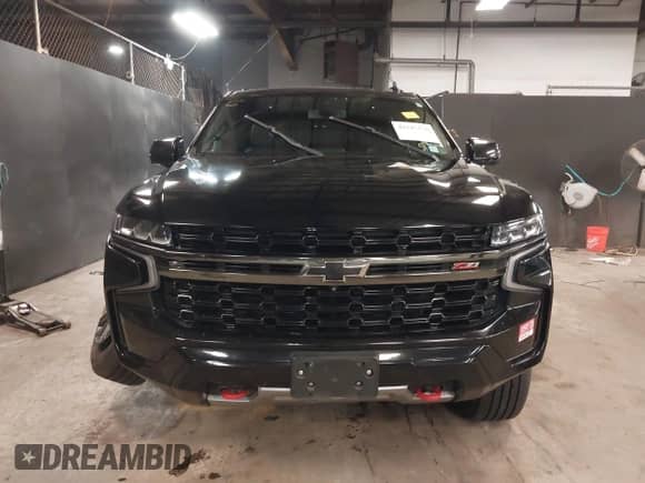 2021 Chevrolet Suburban Z71 with VIN 1GNSKDKD3MR140935, listed as a IAAI auction lot 42345178 with 52,370 mi miles and . Bid and sale history available at DreamBid. Image 12.