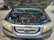 2009 Honda Pilot Touring with VIN 5FNYF48969B025883, listed as a Copart auction lot 70923065 with 192,552 mi miles and Salvage title. Bid and sale history available at DreamBid. Image 12.