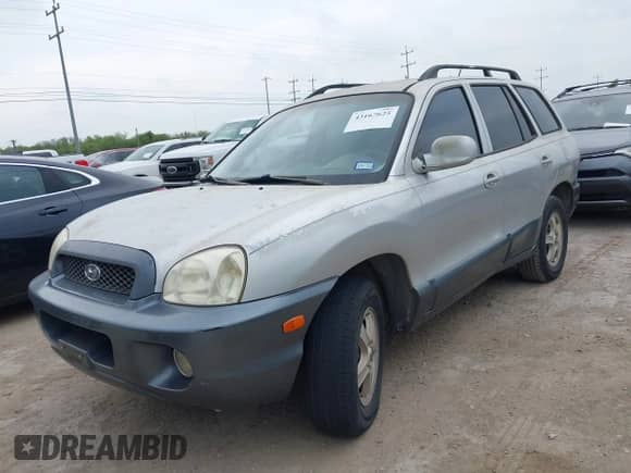 2004 Hyundai Santa Fe GLS z VIN KM8SC13D14U790164, wystawiony jako IAAI lot #43167625 z przebiegiem 178 439 mil mil oraz . Historia ofert i sprzedaży dostępna na DreamBid. Obrazek 6.