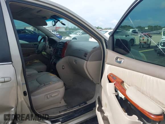 2004 Toyota Sienna XLE z VIN 5TDZA22C94S005059, wystawiony jako IAAI lot #43152895 z przebiegiem 187 536 mil mil oraz . Historia ofert i sprzedaży dostępna na DreamBid. Obrazek 5.