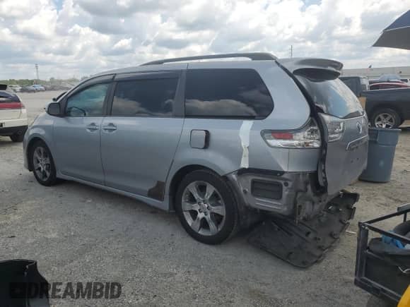 2012 Toyota Sienna SE with VIN 5TDXK3DC5CS259339, listed as a Copart auction lot 68835155 with 266,868 mi miles and Salvage title. Bid and sale history available at DreamBid. Image 2.