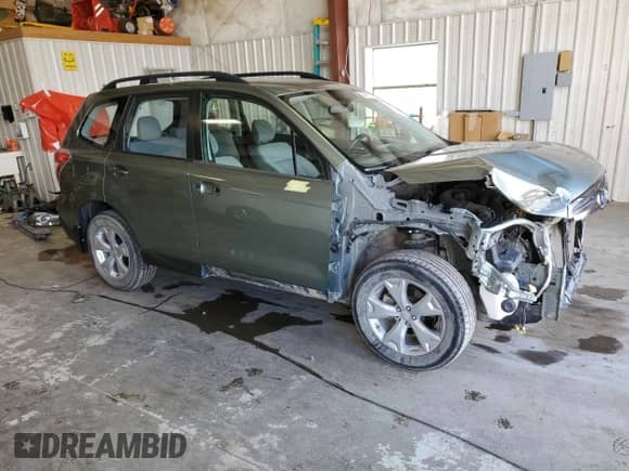 2015 Subaru Forester z VIN SA0123301, wystawiony jako Copart lot #54677574 z przebiegiem 58 430 mil mil oraz Szkoda całkowita • Salvage title. Historia ofert i sprzedaży dostępna na DreamBid. Obrazek 4.