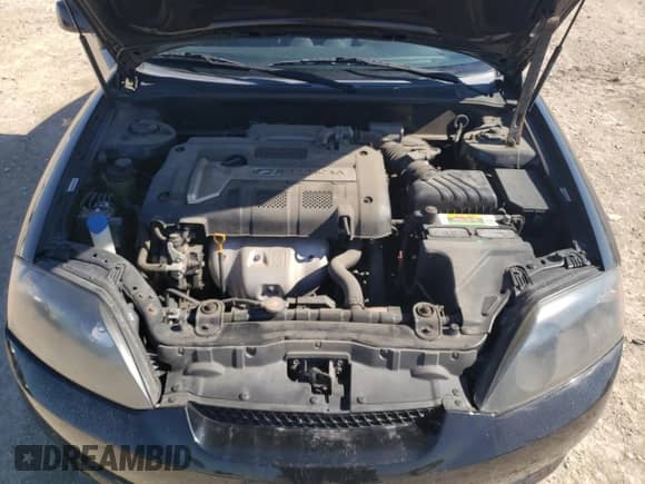 2006 Hyundai Tiburon GS с VIN KMHHM65D76U223249, выставлен на аукционе Copart как лот 45228195 с пробегом 45 420 миль миль и Списание • Salvage title. История ставок и продаж доступна на DreamBid. Изображение 11.