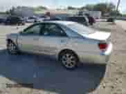 2005 Toyota Camry XLE с VIN 4T1BF30K35U614921, выставлен на аукционе Copart как лот 82188865 с пробегом 180 619 миль миль и Списание • Salvage title. История ставок и продаж доступна на DreamBid. Изображение 2.