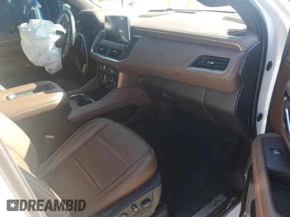 2021 Chevrolet Tahoe High Country with VIN 1GNSKTKL9MR155067, listed as a Copart auction lot 69469445 with 33,142 mi miles and Salvage title. Bid and sale history available at DreamBid. Image 8.