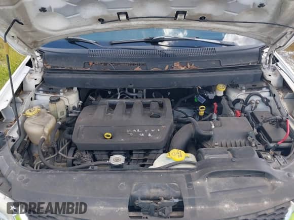 2012 Dodge Journey SE z VIN 3C4PDCABXCT255928, wystawiony jako IAAI lot #42536508 z przebiegiem 148 167 mil mil oraz . Historia ofert i sprzedaży dostępna na DreamBid. Obrazek 10.