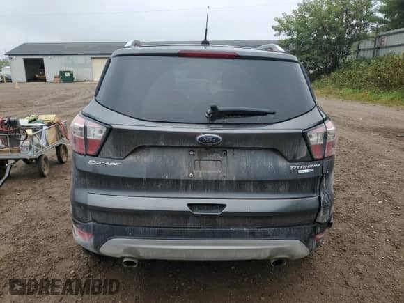 2017 Ford Escape Titanium с VIN 1FMCU9J91HUE33524, выставлен на аукционе Copart как лот 81630775 с пробегом 153 271 миль миль и Чистый • Clean title. История ставок и продаж доступна на DreamBid. Изображение 6.