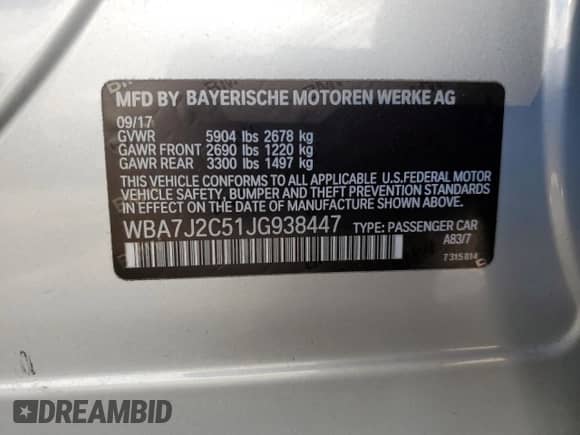 2018 BMW 7 Series 740e xDrive with VIN WBA7J2C51JG938447, listed as a Copart auction lot 63021064 with 81,105 mi miles and Salvage title. Bid and sale history available at DreamBid. Image 13.