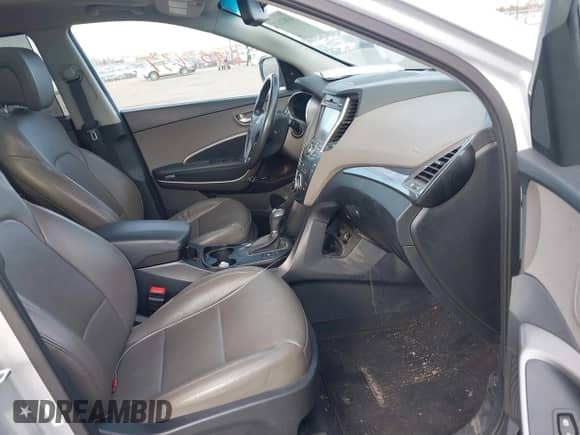 2016 Hyundai Santa Fe с VIN 5XYZW4LA6GG310398, выставлен на аукционе IAAI как лот 41802637 с пробегом 171 973 миль миль и . История ставок и продаж доступна на DreamBid. Изображение 5.