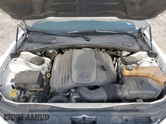 2015 Chrysler 300 S с VIN 2C3CCABT4FH739432, выставлен на аукционе Copart как лот 55140875 с пробегом 156 905 миль миль и Списание • Salvage title. История ставок и продаж доступна на DreamBid. Изображение 11.