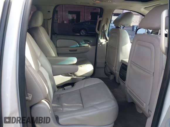 2014 Chevrolet Suburban LTZ with VIN 1GNSKKE79ER139252, listed as a IAAI auction lot 41197789 with 170,065 mi miles and . Bid and sale history available at DreamBid. Image 8.