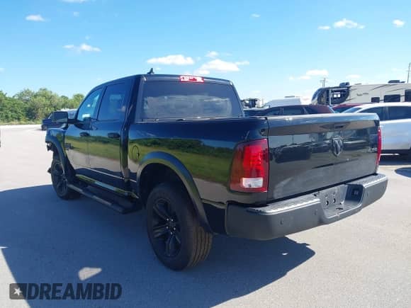 2022 Ram 1500 Warlock with VIN 1C6RR7LG4NS176356, listed as a IAAI auction lot 43423807 with 66,707 mi miles and . Bid and sale history available at DreamBid. Image 3.