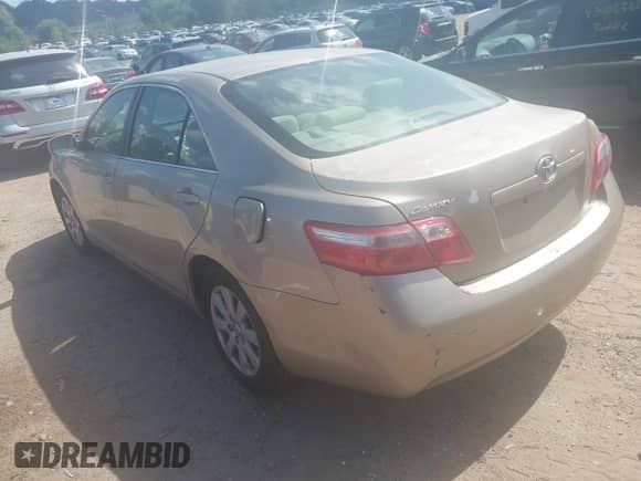 2007 Toyota Camry CE z VIN JTNBE46K973047641, wystawiony jako IAAI lot #43102257 z przebiegiem 218 123 mil mil oraz . Historia ofert i sprzedaży dostępna na DreamBid. Obrazek 3.