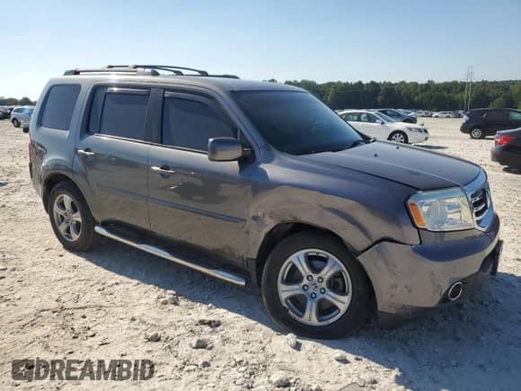 2014 Honda Pilot EX z VIN 5FNYF3H40EB005282, wystawiony jako Copart lot #80303255 z przebiegiem 124 157 mil mil oraz Szkoda całkowita • Salvage title. Historia ofert i sprzedaży dostępna na DreamBid. Obrazek 4.