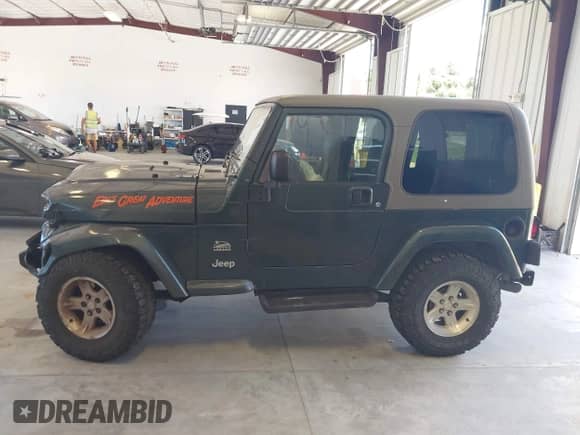 2004 Jeep Wrangler Sahara с VIN 1J4FA59S34P740481, выставлен на аукционе IAAI как лот 43008956 с пробегом 210 346 миль миль и . История ставок и продаж доступна на DreamBid. Изображение 14.