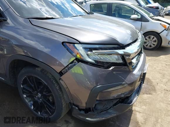 2019 Honda Pilot Touring 8-Passenger z VIN 5FNYF6H9XKB002530, wystawiony jako IAAI lot #43112644 z przebiegiem 122 140 mil mil oraz . Historia ofert i sprzedaży dostępna na DreamBid. Obrazek 6.