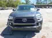 2021 Toyota Tacoma SR5 z VIN 5TFDZ5BN6MX059581, wystawiony jako IAAI lot #42051740 z przebiegiem 65 399 mil mil oraz . Historia ofert i sprzedaży dostępna na DreamBid. Obrazek 13.