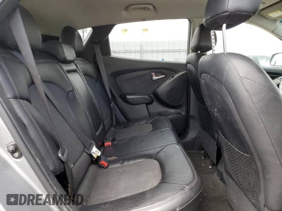 2013 Hyundai Tucson GLS z VIN KM8JUCAC7DU728931, wystawiony jako Copart lot #64497845 z przebiegiem 198 224 mil mil oraz Szkoda całkowita • Salvage title. Historia ofert i sprzedaży dostępna na DreamBid. Obrazek 11.