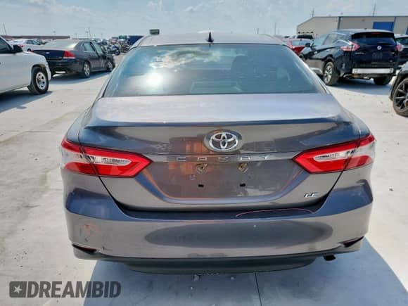2019 Toyota Camry LE с VIN 4T1B11HK7KU815143, выставлен на аукционе Copart как лот 69475835 с пробегом 122 992 миль миль и Списание • Salvage title. История ставок и продаж доступна на DreamBid. Изображение 6.