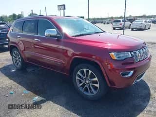 2017 Jeep Grand Cherokee Overland with VIN 1C4RJFCG7HC658943, listed as a IAAI auction lot 42282213 with 103,291 mi miles and . Bid and sale history available at DreamBid. Image 1.