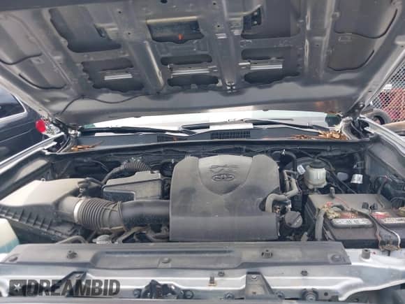 2019 Toyota Tacoma SR z VIN 3TMCZ5AN8KM287646, wystawiony jako IAAI lot #42969397 z przebiegiem 100 562 mil mil oraz . Historia ofert i sprzedaży dostępna na DreamBid. Obrazek 10.