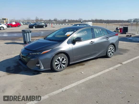 2018 Toyota Prius Plus z VIN JTDKARFP9J3072801, wystawiony jako IAAI lot #41741739 z przebiegiem 80 953 mil mil oraz . Historia ofert i sprzedaży dostępna na DreamBid. Obrazek 19.
