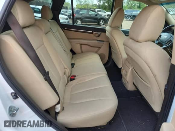 2011 Hyundai Santa Fe GLS z VIN 5XYZGDAG4BG020352, wystawiony jako Copart lot #68807315 z przebiegiem 240 957 mil mil oraz Szkoda całkowita • Salvage title. Historia ofert i sprzedaży dostępna na DreamBid. Obrazek 10.