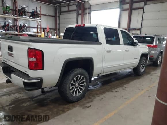 2017 GMC Sierra 1500 SLE with VIN 3GTU2MEC4HG374723, listed as a IAAI auction lot 41400381 with 141,896 mi miles and . Bid and sale history available at DreamBid. Image 4.