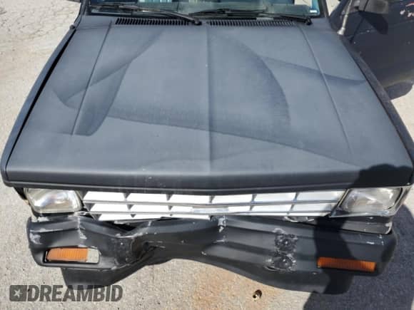 1988 Chevrolet S-10 с VIN 1GCBS14EXJ2211002, выставлен на аукционе Copart как лот 86115435 с пробегом 221 077 миль миль и На запчасти • Non repairable. История ставок и продаж доступна на DreamBid. Изображение 11.