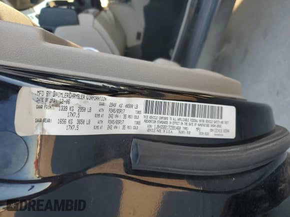 2007 Jeep Commander Limited z VIN 1J8HG58217C591460, wystawiony jako Copart lot #44587295 z przebiegiem 246 933 mil mil oraz Szkoda całkowita • Salvage title. Historia ofert i sprzedaży dostępna na DreamBid. Obrazek 13.