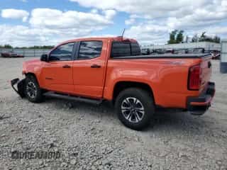 2021 Chevrolet Colorado 4WD Z71 z VIN 1GCGTDEN0M1177214, wystawiony jako Copart lot #69223365 z przebiegiem 34 944 mil mil oraz Czysty tytuł • Clean title. Historia ofert i sprzedaży dostępna na DreamBid. Obrazek 2.