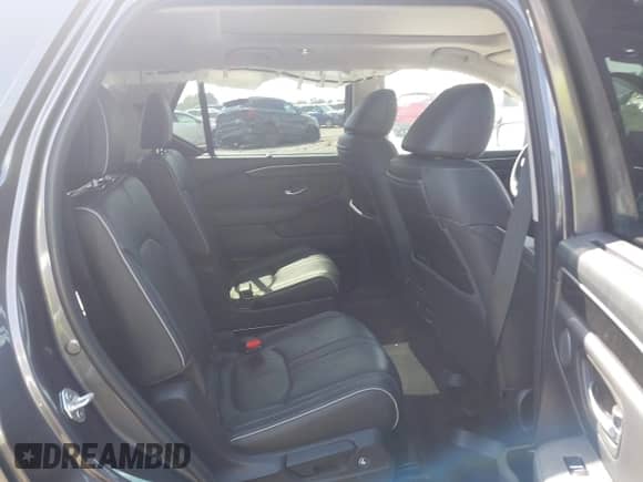 2023 Honda Pilot Elite with VIN 5FNYG1H8XPB040628, listed as a IAAI auction lot 42718726 with 28,663 mi miles and . Bid and sale history available at DreamBid. Image 8.