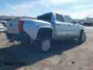 2024 Toyota Tacoma SR with VIN 3TYKD5HN4RT016047, listed as a IAAI auction lot 41335702 with Not provided miles and . Bid and sale history available at DreamBid. Image 4.