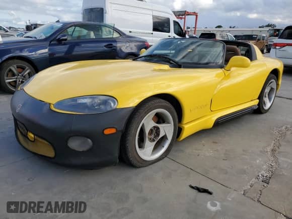 1995 Dodge Viper with VIN 1B3BR65E0SV201376, listed as a Copart auction lot 74423504 with Not provided miles and Salvage title. Bid and sale history available at DreamBid. Image 1.