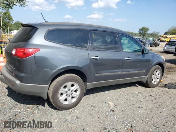 2012 Chevrolet Traverse LS с VIN 1GNKRFED5CJ284406, выставлен на аукционе Copart как лот 81315385 с пробегом 115 447 миль миль и Списание • Salvage title. История ставок и продаж доступна на DreamBid. Изображение 3.